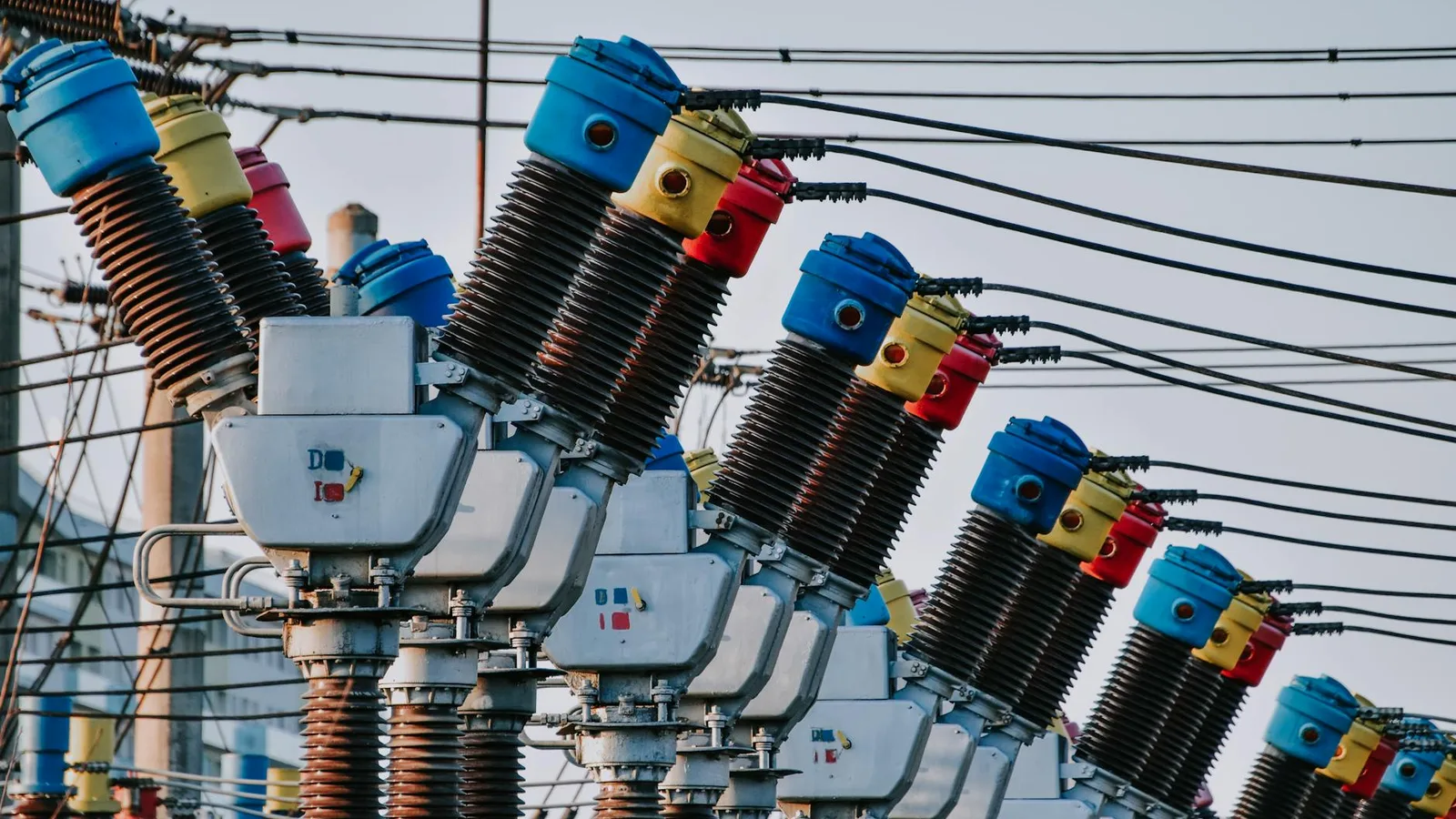 Architectural Approaches to Fault-Tolerant Distributed Quantum Computing and Their Entanglement Overheads